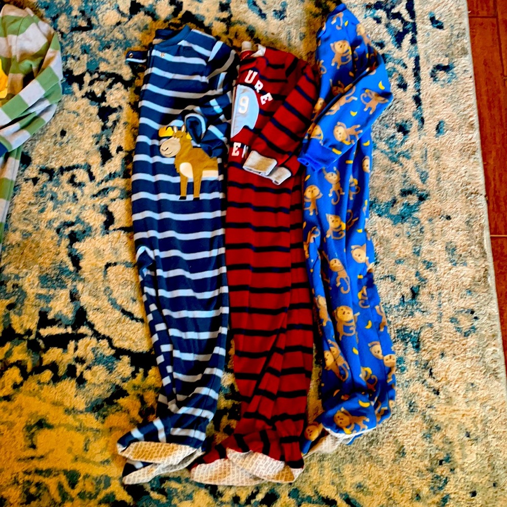 3 pairs of 4t footed pajamas. GUC